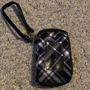 Wallet holds phone, license, money, and change